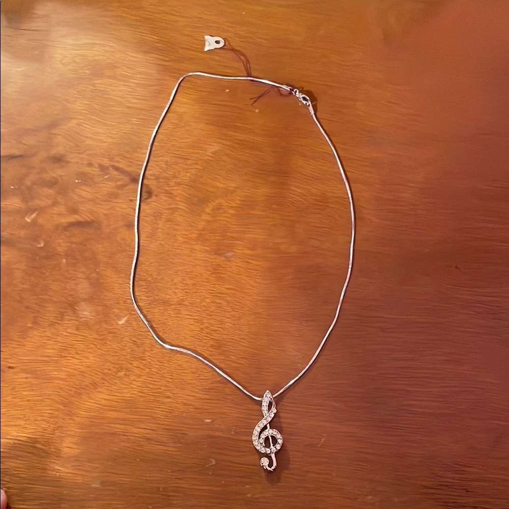 Elegant Silver Treble Clef Necklace